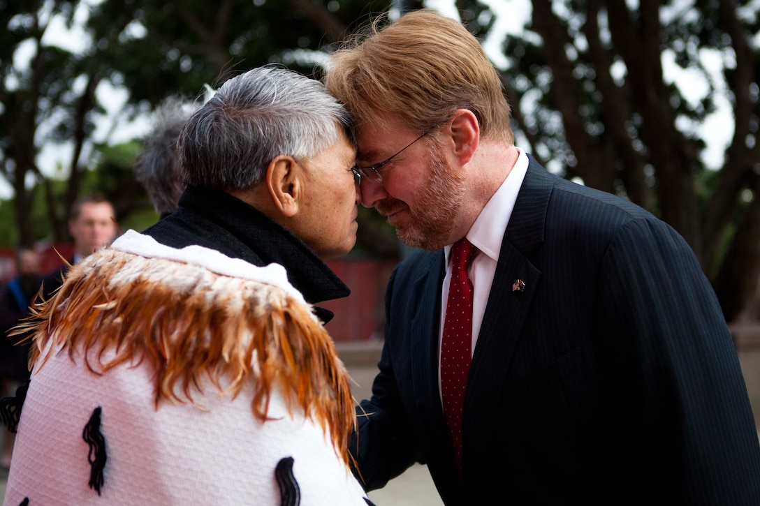 WELLINGTON, New Zealand - Sam Jackson greets David Huebner, U.S. ambassador to New Zealand, with a honge, a traditional Maori greeting, before entering the National War Memorial here June 14. Huebner attended a wreath-laying ceremony commemorating the 70th anniversary of U.S. Marines landing in Wellington during World War II. (U.S. Marine Corps photo by: Cpl. Isis Ramirez/released)