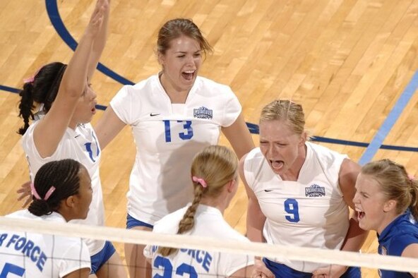 Then Cadet Kristina Stewart (No. 9), celebrates with her U.S. Air Force Academy teammates during a 2008 volleyball match against Colorado State University.  Stewart, a first lieutenant in the 3rd Space Operations Squadron earned a spot on the All-Air Force Women's Volleyball team and will compete at the All-Armed Force Women's Volleyball tournament at Great Lakes Naval Station, Ill. (Courtesy photo)