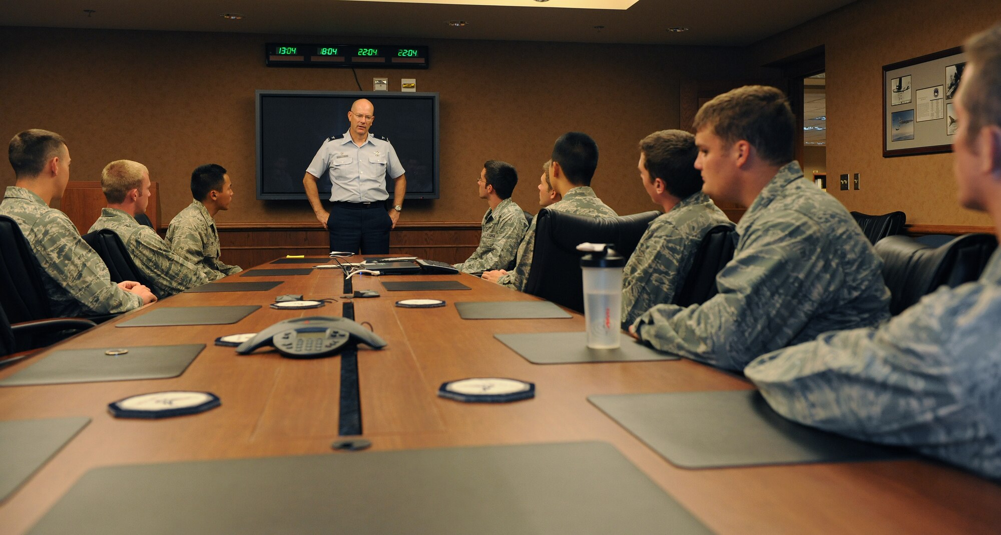Col. Thomas Riney, 22nd Operations Group commander, speaks with Operation Air Force cadets June 18, 2012, McConnell Air Force Base, Kan. Riney shared some of his experiences as being an officer, offered advice and presented each cadet with a wing commander coin. The eleven cadets are touring McConnell to learn about the wing’s overall mission and to spend time with senior leaders for personal mentoring. (U.S. Air Force photo/Airman 1st Class Katrina M. Brisbin)