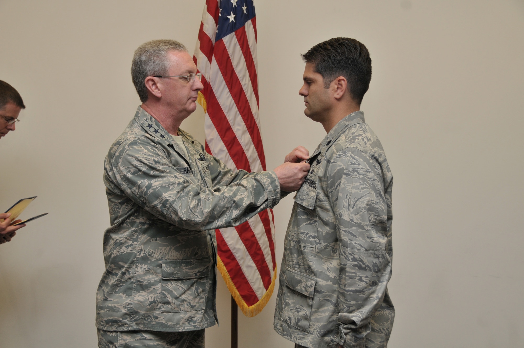 Lt. Col. Douglas Edwards (right), 906th Air Refueling Squadron Commander, receives the Airman’s Medal from Lt. Gen. Mark Ramsay, 18th Air Force Commander, in a ceremony at Scott AFB, IL on May 21, 2012.  Edwards received the award for rescuing an elderly woman from a burning vehicle on Nov. 2, 2009 near King Hill, Idaho.  With complete disregard for his own safety, Edwards succeeded in freeing the injured and trapped victim from her car just moments before the entire vehicle became engulfed in flames.  Local Sheriff Deputies responded within eight minutes of the initial 9-1-1 call about the accident and later told Edwards the victim would have been burned alive if he hadn’t acted so quickly.  (U.S. Air Force photo by Master Sgt. Franklin Hayes)