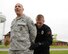 As part of a quality control evaluation training exercise, Securitas Officer Ken Tullos (right) searches Master Sgt. Peter N. Vatistas for unauthorized weapons, Pease Air National Guard Base, New Hampshire, June 19, 2012.  Vatistas is assigned to the 157th Security Forces Squadron here at Pease.  (National Guard photo by Staff Sgt. Curtis J. Lenz/RELEASED)