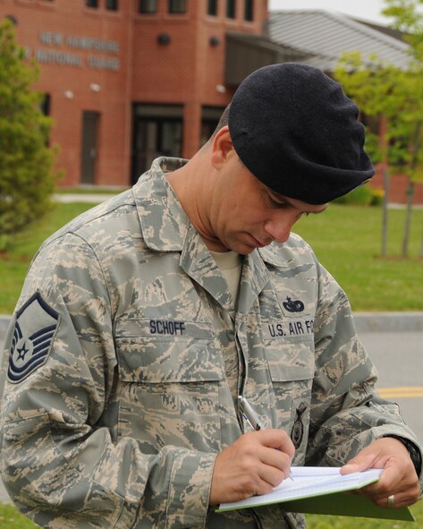 Master Sgt. Matthew S. Schoff, takes notes during a quality control evaluation training exercise Pease Air National Guard Base, New Hampshire, June 19, 2012. Schoff  is assigned to the 157th Security Forces Squadron here at Pease.  (National Guard photo by Staff Sgt. Curtis J. Lenz/RELEASED)
