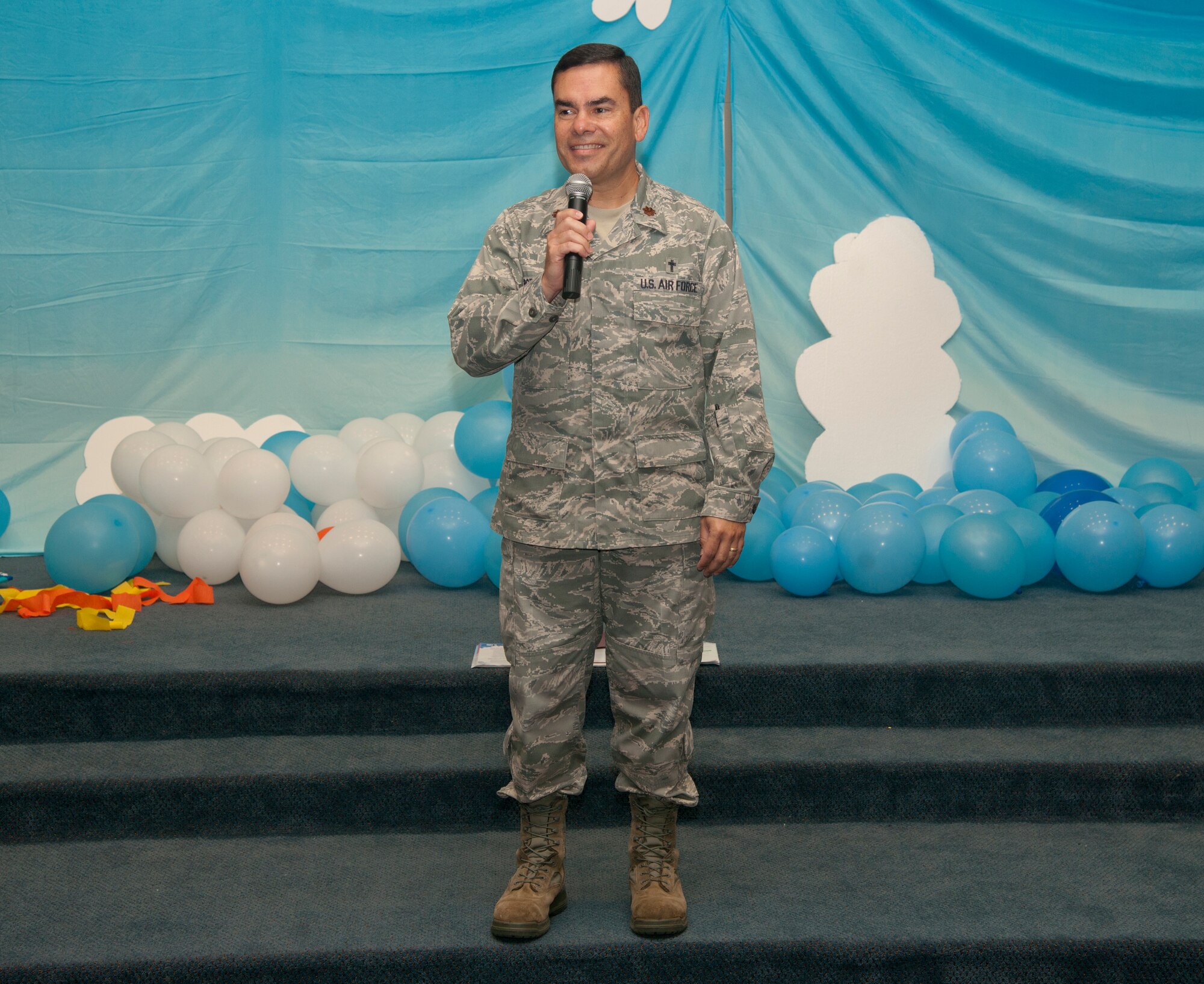 U.S. Air Force Chaplain (Maj.) Ismael Rodriguez leads a prayer during Fly Vacation Bible School at Moody Air Force, Ga., June 14, 2012. The students started off each day with a prayer and learned the verse of the day before participating in the day’s activities. (U.S. Air Force photo by Airman 1st Class Paul Francis/Released)