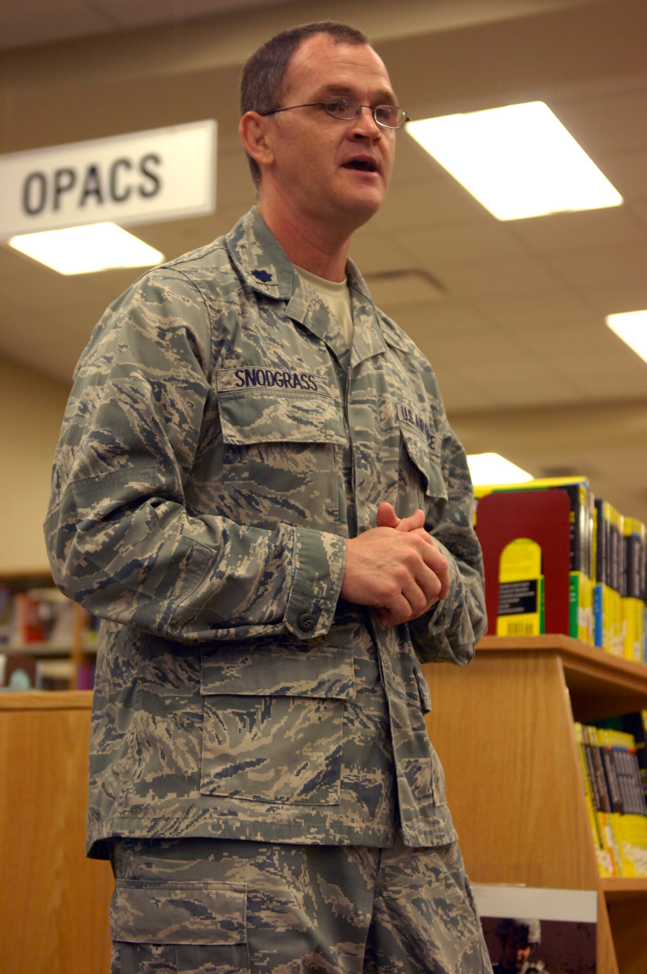 SHAW AIR FORCE BASE, S.C. - Lt. Col. Robert Snodgrass, 20th Mission Support Group deputy commander, speaks with children at base library at Shaw Air Force Base, S.C., to begin the summer reading program, called, ?Reading is so Delicious,? June 12, 2012. Over 250 children register for the program this year and the goal is for each participant to read 2,000 pages. There will be events at the library throughout the week aimed to keeping the children engaged and entertained. (U.S. Air Force photo by Airman 1st Class Krystal M. Jeffers/Released)