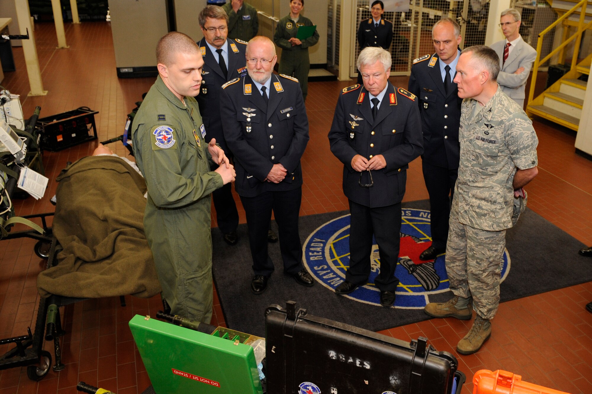 German air force surgeon general (Brig. Gen.) Joerg Binneweis, visits Aeromedical Evacuation Squadron at Ramstein Air Base, Germany, June 13, 2012. This visit gave the German air force general the opportunity to observe the hard work of the U.S. service members who ensure wounded warriors receive world-class care. (U.S. Air Force photo/Senior Airman Aaron-Forrest Wainwright)
