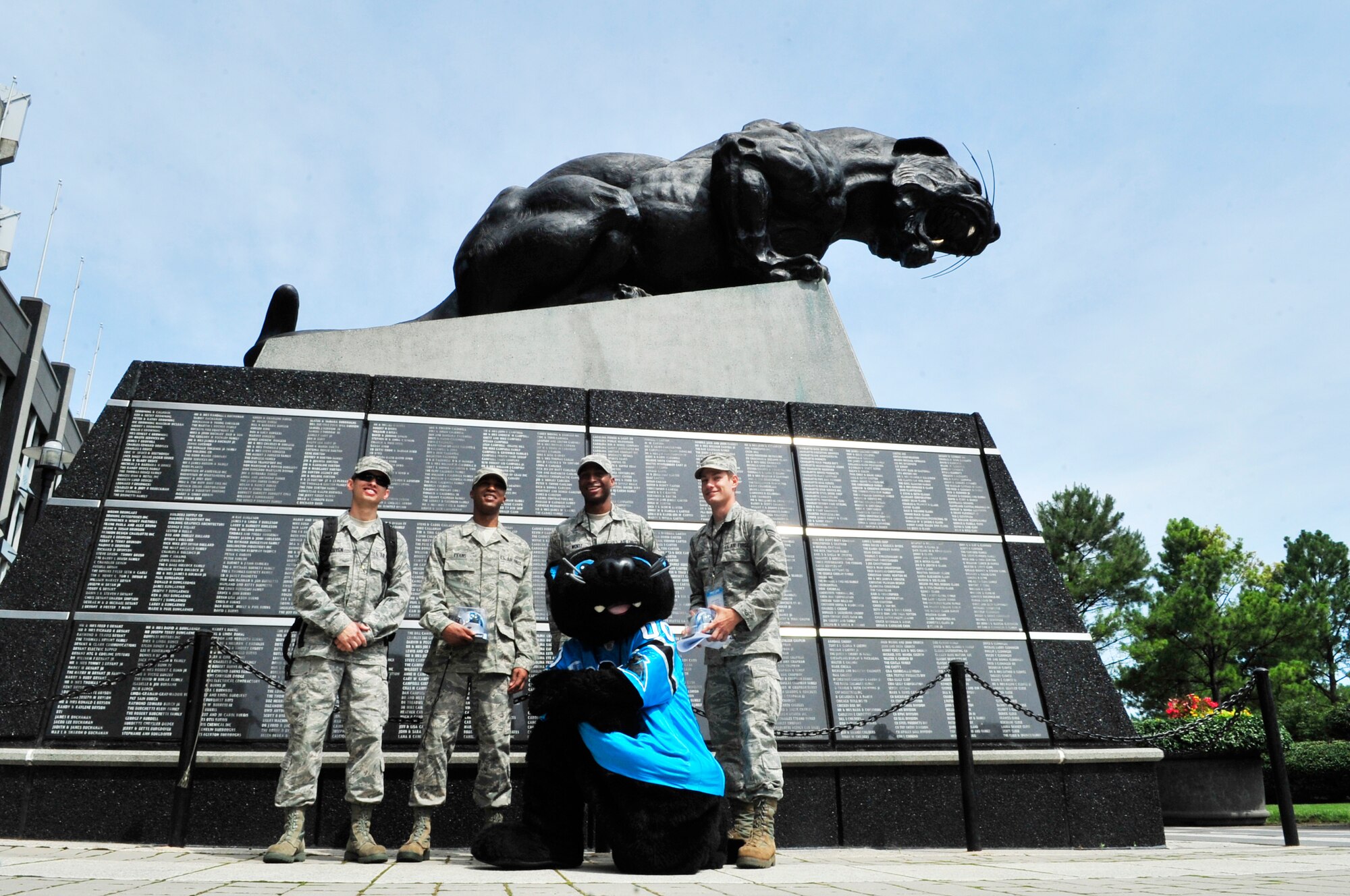 U.S. Air Force Airmen gather for a group photo with the Carolina Panthers team mascot at the Bank of America Stadium, Charlotte, N.C., June 14, 2012.  Airmen from Shaw Air Force Base attended this sponsored minicamp practice.(U.S. Air Force photo by Airman Nicole Sikorski/Released)

