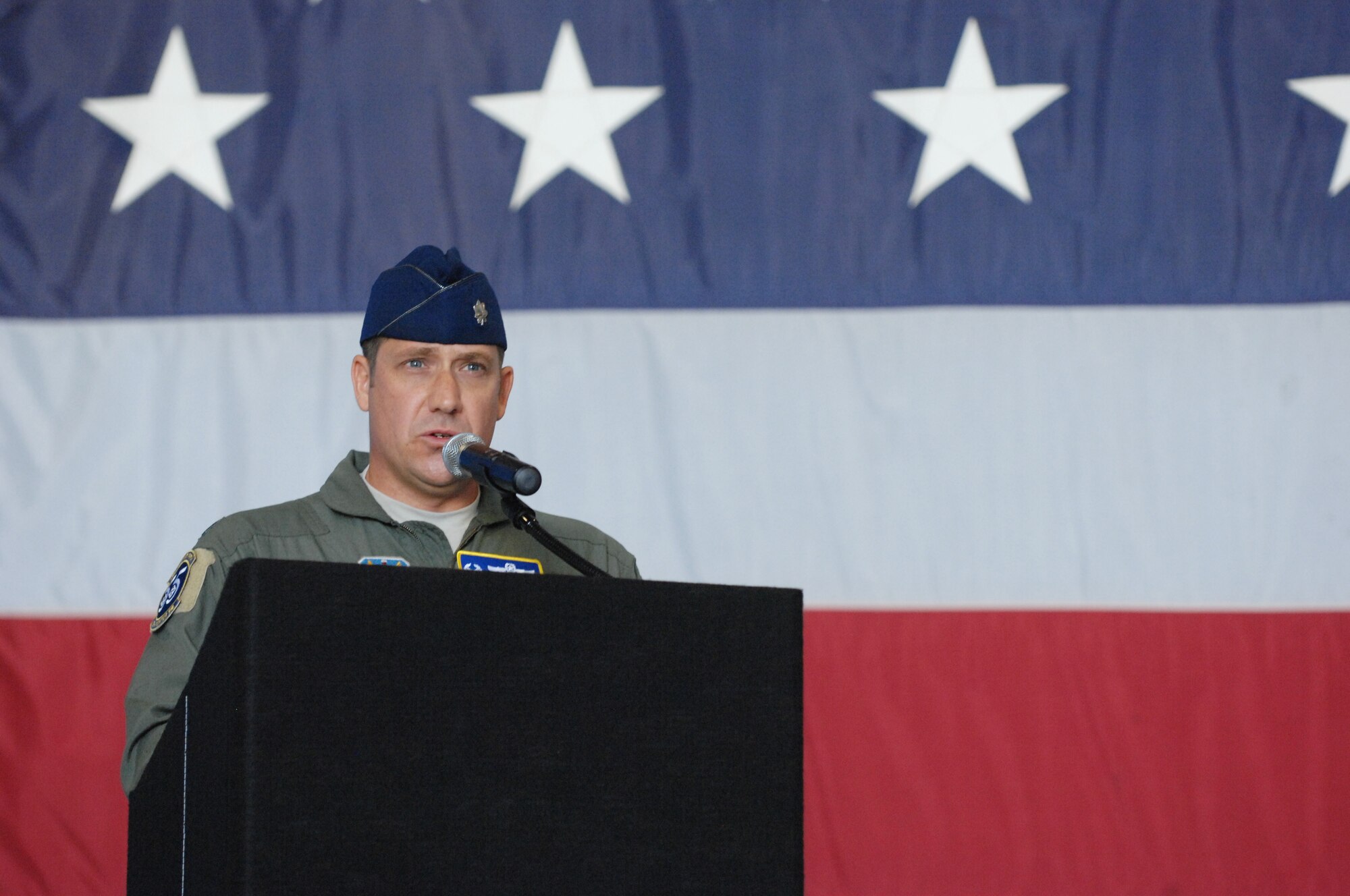 U.S. Air Force Lt. Col. Christopher Claus, 55th Fighter Squadron commander, speaks at the change of command ceremony, Shaw Air Force Base, S.C., June 15, 2012. Claus assumed command in place of Lt. Col. Micheal Schnabel, prior 55th Fighter Squadron commander.(U.S. Air Force Airman Nicole Sikorski/Released)