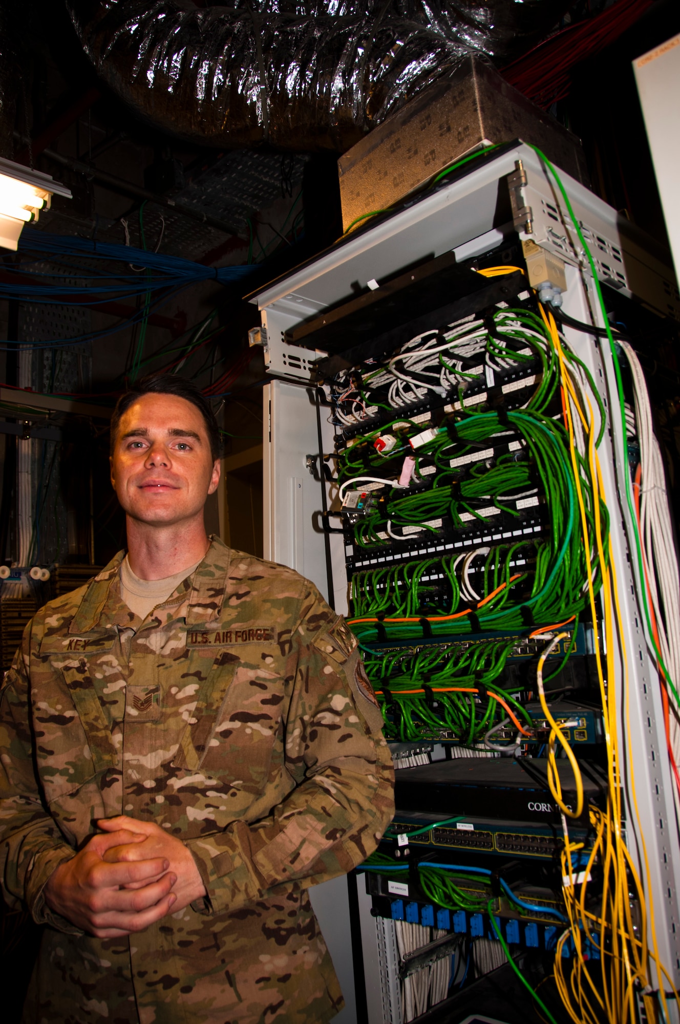 TSgt Kenneth Key, NCOIC of 455th Medical Information Systems works on a computer network at Bagram Airfield, Afghanistan, June 19, 2012. Key leads the IT help desk for the Craig Joint Theater Hospital, the most intensive Role III medical facility in USCENTCOM. He supervises a joint team responsible completeing all CJTH IT work orders, managing 335 user accounts on two networks and, maintaining six separate systems. (U.S. Air Force photo/TSgt Shawn McCowan)
