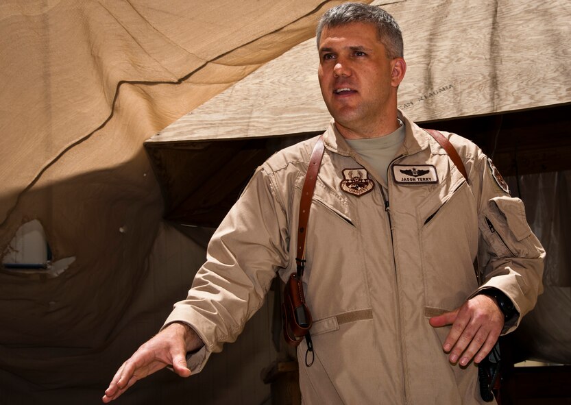 Lt. Col. Jason Terry, 52nd Airlift Squadron Director of Operations, addresses his Airmen as 455th deputy Operations Group commander, at Bagram Airfield, Afghanistan, during a brief celebration June 15, 2012 honoring their unit’s 70th Anniversary while deployed in support of Operation Enduring Freedom. (U.S. Air Force photo/TSgt Shawn McCowan)