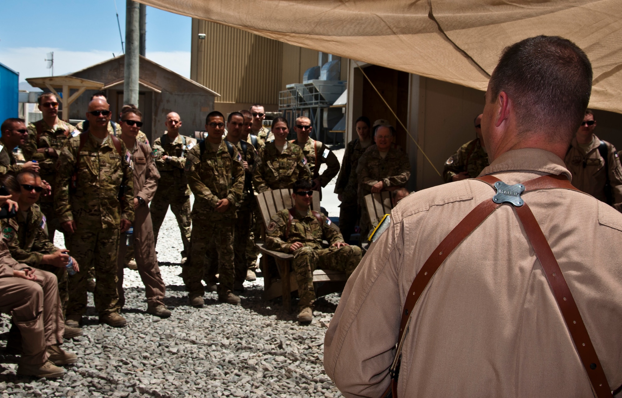 Lt. Col. Tim Julian, 50th Airlift Squadron commander, addresses his Airmen as the 774th Expeditionary Airlift Squadron commander at Bagram Airfield, Afghanistan, during a recent celebration breifly honoring their unit’s 70th Anniversary while deployed in support of Operation Enduring Freedom. (U.S. Air Force photo/TSgt Shawn McCowan)