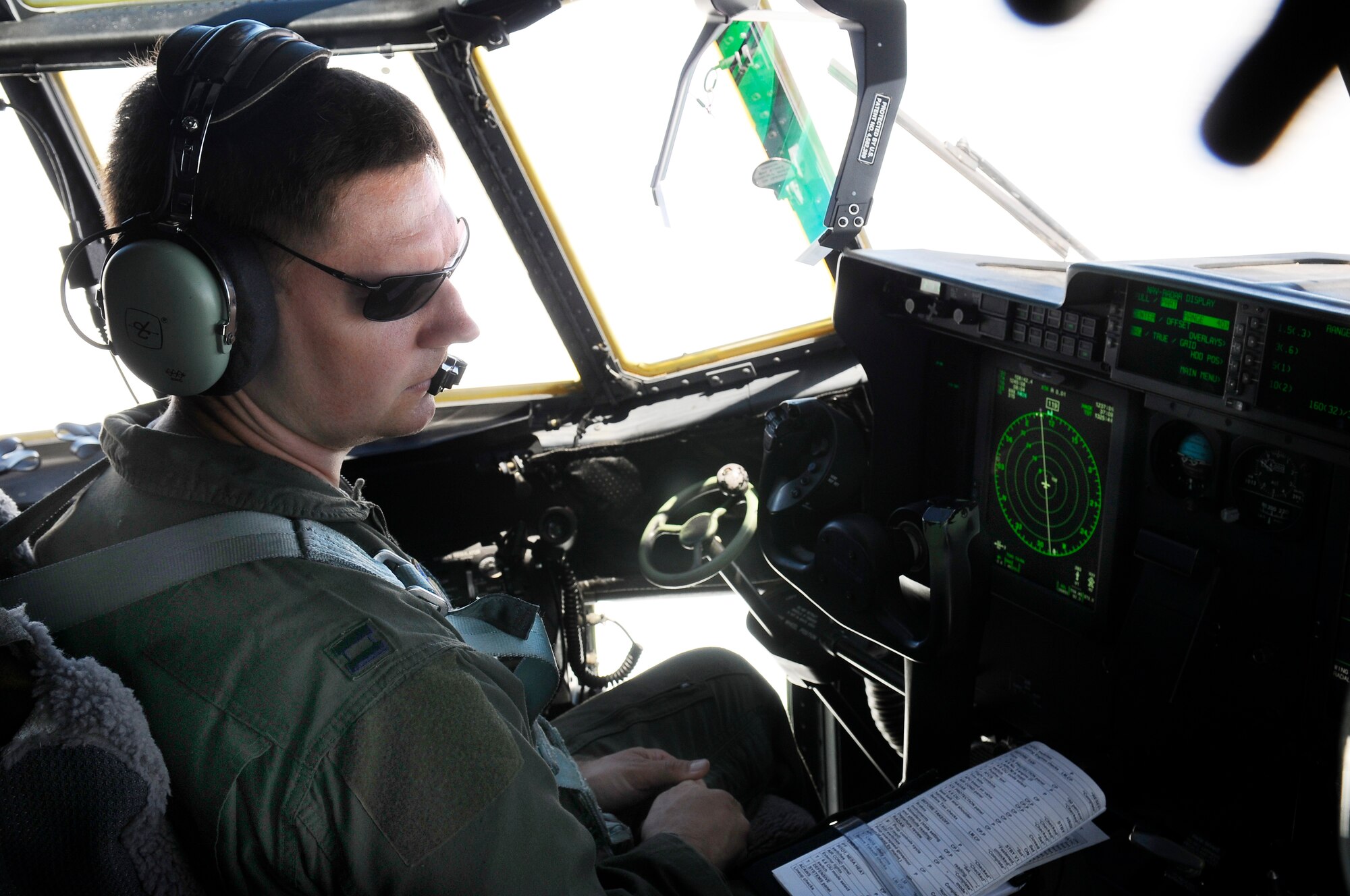 Capt. Dan Walton, 86th Airlift Wing executive officer, C-130J Super Hercules pilot and mission commander for the Normandy off-station training, flies a C-130J Super Hercules back to Ramstein Air Base, Germany June 7, from Normandy, France. The mission commander is in charge of creating timelines, procuring aircraft, personnel and ensuring the success of the overall mission. Walton was in charge of the three C-130Js, three Air Force Reserve Command C-130s, one Air National Guard C-130, a special operations cargo aircraft and a German Transall C-160 who dropped more than 120 parachutists onto the fields of Normandy.