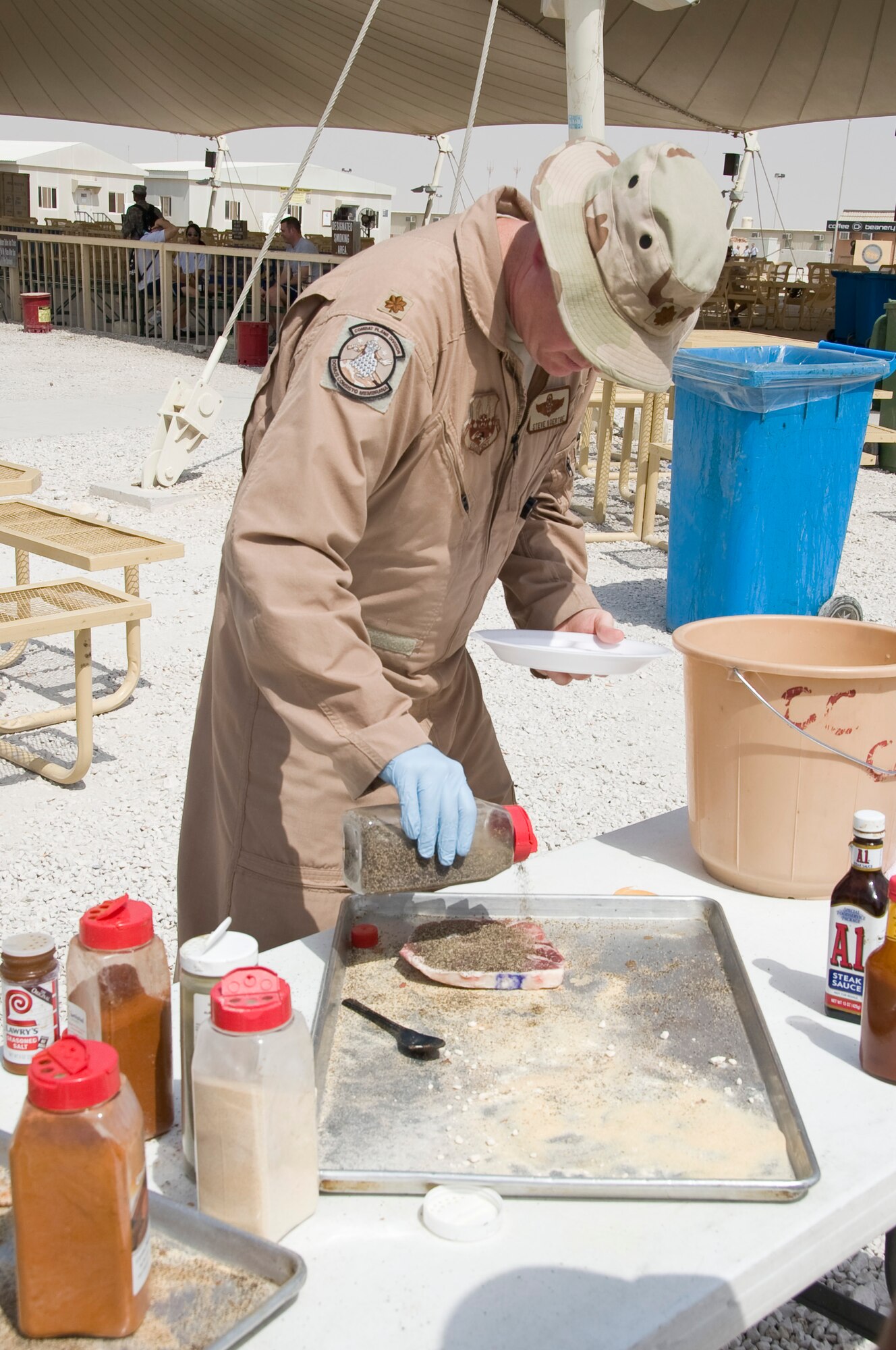 SOUTHWEST ASIA - Service members made the most of their deployed Father’s Day as many marinated and grilled their own T-bone steaks here June 17. The 379th Air Expeditionary Wing provided home-comfort activities to deployed service members who are supporting ongoing contingency operations in Southwest Asia. (U.S. Air Force photo/Senior Airman Bryan Swink)