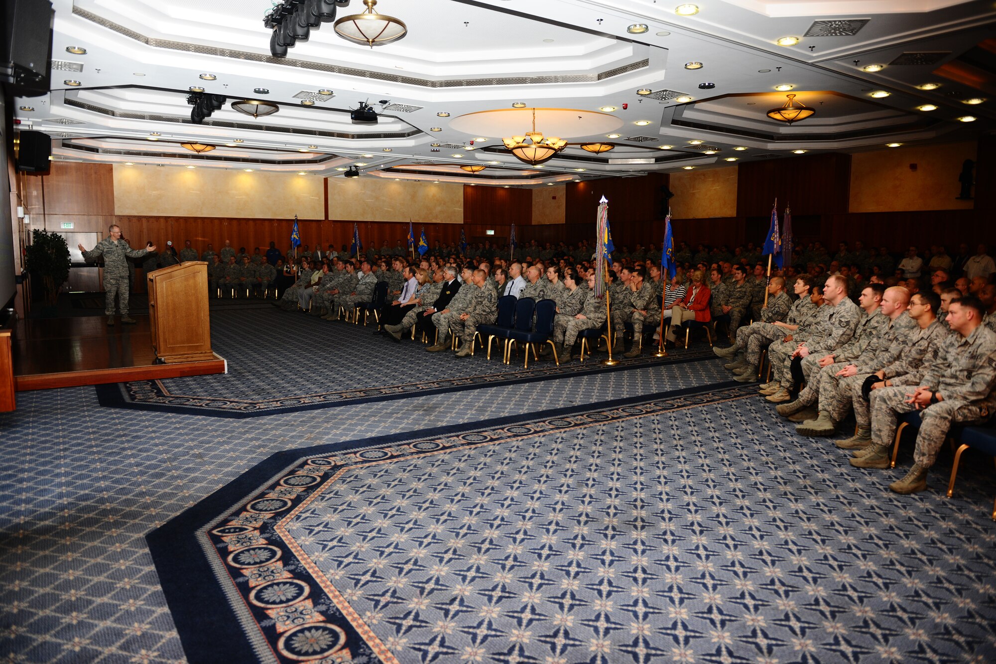 SPANGDAHLEM AIR BASE, Germany – Brig. Gen. Chris Weggeman, 52nd Fighter Wing commander, speaks during the in-brief for the Air Force Services Agency Innkeeper Award review team at the Club Eifel ballroom here June 18. The Eifel Arms Inn is competing for the 2012 Air Force Best Small Lodging Operation against three other lodging facilities. (U.S. Air Force photo by Airman 1st Class Matthew B. Fredericks/Released)