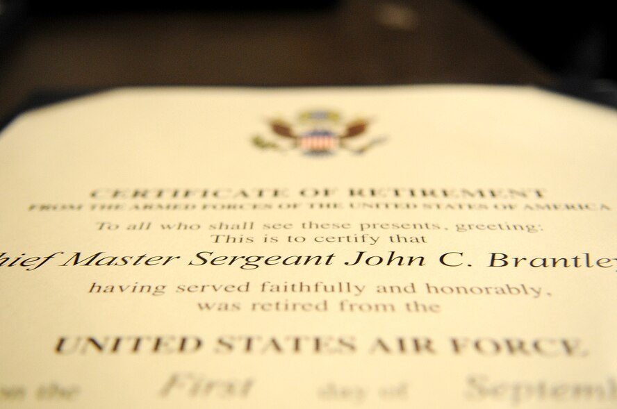 Chief Master Sgt. John Brantley's retirement certificate was presented to him during an official ceremony May 18, 2012, at Barksdale Air Force Base, La. From humble beginnings in Dublin, Ga., he rose to the top enlisted rank after only 21 years in service with a dedicated work ethic that led him to win many annual awards at the Airman, NCO and senior NCO levels. (U.S. Air Force photo/Senior Airman Brigitte N. Brantley)