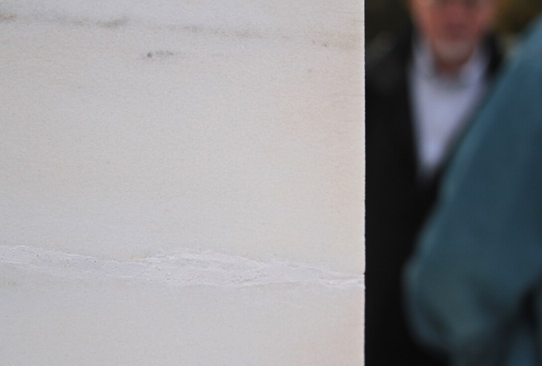 Experts gathered at the Tomb of Unknowns at Arlington National Cemetery Oct. 21, 2011 to inspect repairs made to cracks in the stone of the tomb. (U.S. Army photo/Kerry Solan)