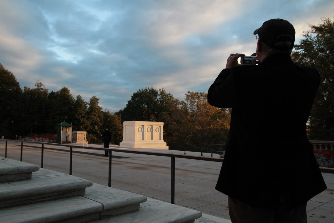 Dr. Dennis Montagna from the National Park Service takes one last look at the Tomb of the Unknowns Oct. 21, 2011. Montagna and other experts were invited by Arlington National Cemetery and Norfolk District, U.S. Army Corps of Engineers to inspect repairs made to cracks in the tomb.  (U.S. Army photo/Kerry Solan)