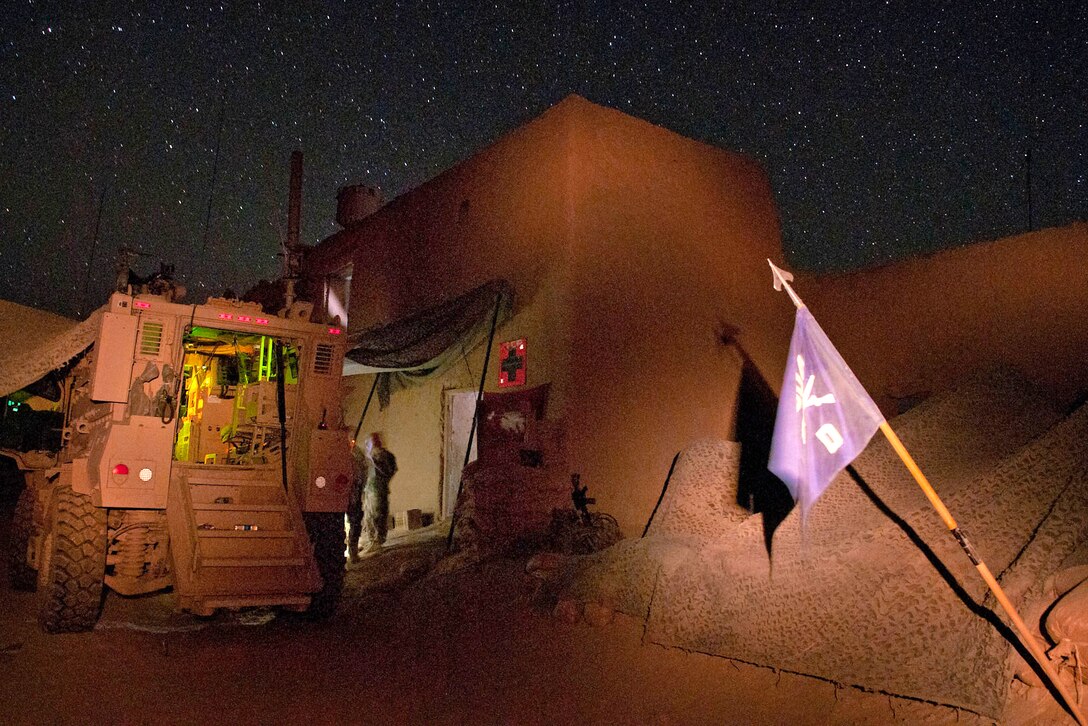 A guidon, or small flag, marks the location of the command post on Joint Security Station Hasan in the Gilan district in southern Afghanistan's Ghazni province, June 11, 2012.