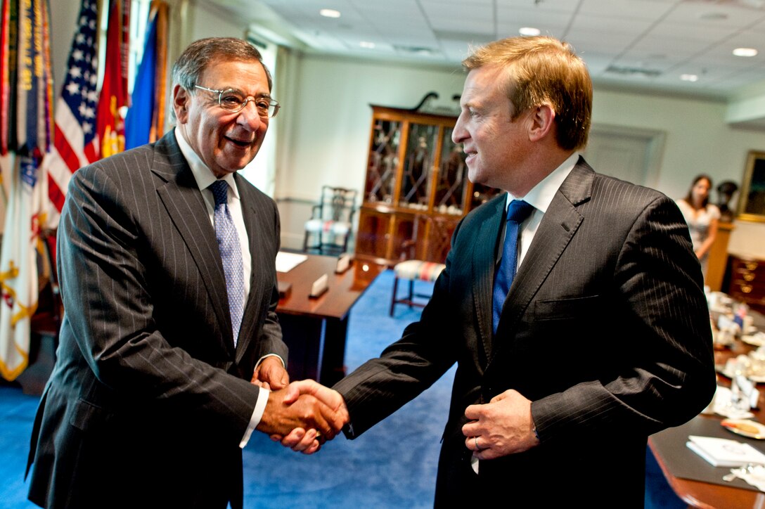 U.S. Defense Secretary Leon E. Panetta, left, and New Zealand Defense Minister Jonathan Coleman thank each other at the Pentagon, June 19, 2012, after signing a defense cooperation arrangement to expand the defense relationship between the two countries and promote a common vision for defense cooperation.