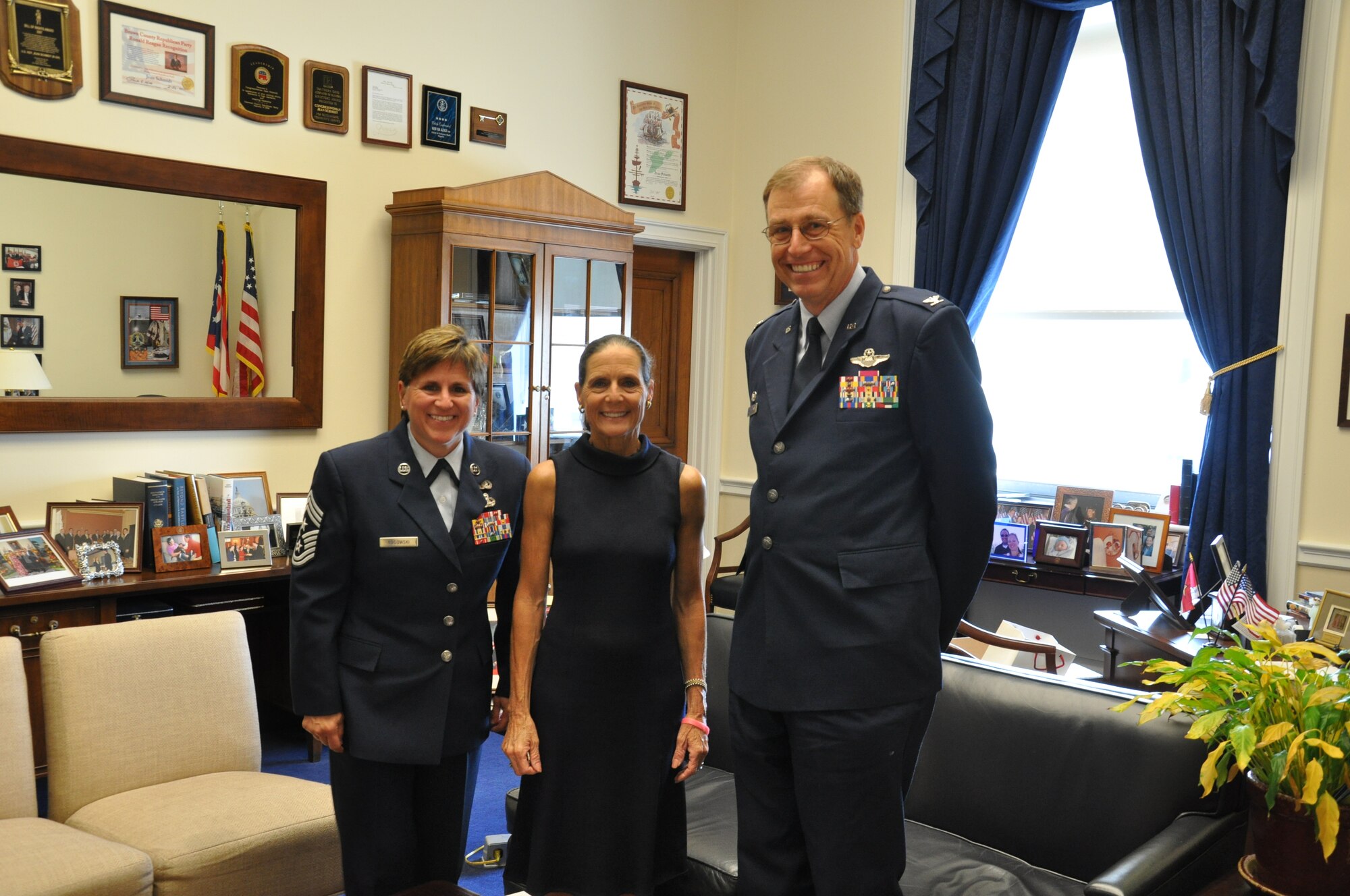 WRIGHT-PATTERSON AIR FORCE BASE, Ohio – Col. Stephen D. Goeman, 445th Airlift Wing commander and Chief Master Sgt. Peri Rogowski, 445th Airlift Wing command chief, visit with Congresswoman Jean Schmidt, the Ohio 2nd District Representative to the United States Congress, June 19. Commanders meet annually with Congressmen representing their areas as part of an Air Force Reserve program to increase their unit’s visibility with members of Congress. (U.S. Air Force photo/Lt. Col. Cynthia Harris)