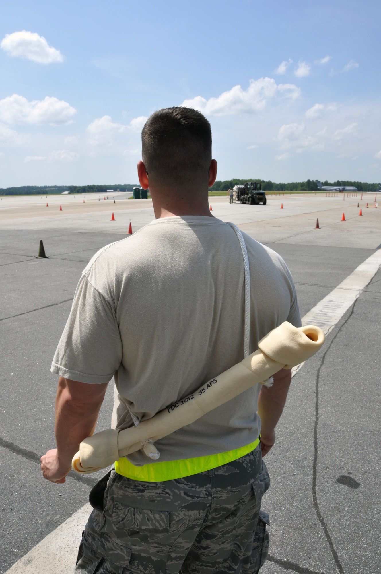 Senior Airman Wayne Rose, of the 35th Aerial Port Squadron, Joint Base McGuire-Dix-Lakehurst, guards his team’s Dawg bone from would-be “thieves” on other teams. This was one of many challenges that Port Dawg teams face at this biennium’s Port Dawg Challenge June 19-21 at Dobbins ARB. (U.S. Air Force photo/Senior Airman Elizabeth Gaston)