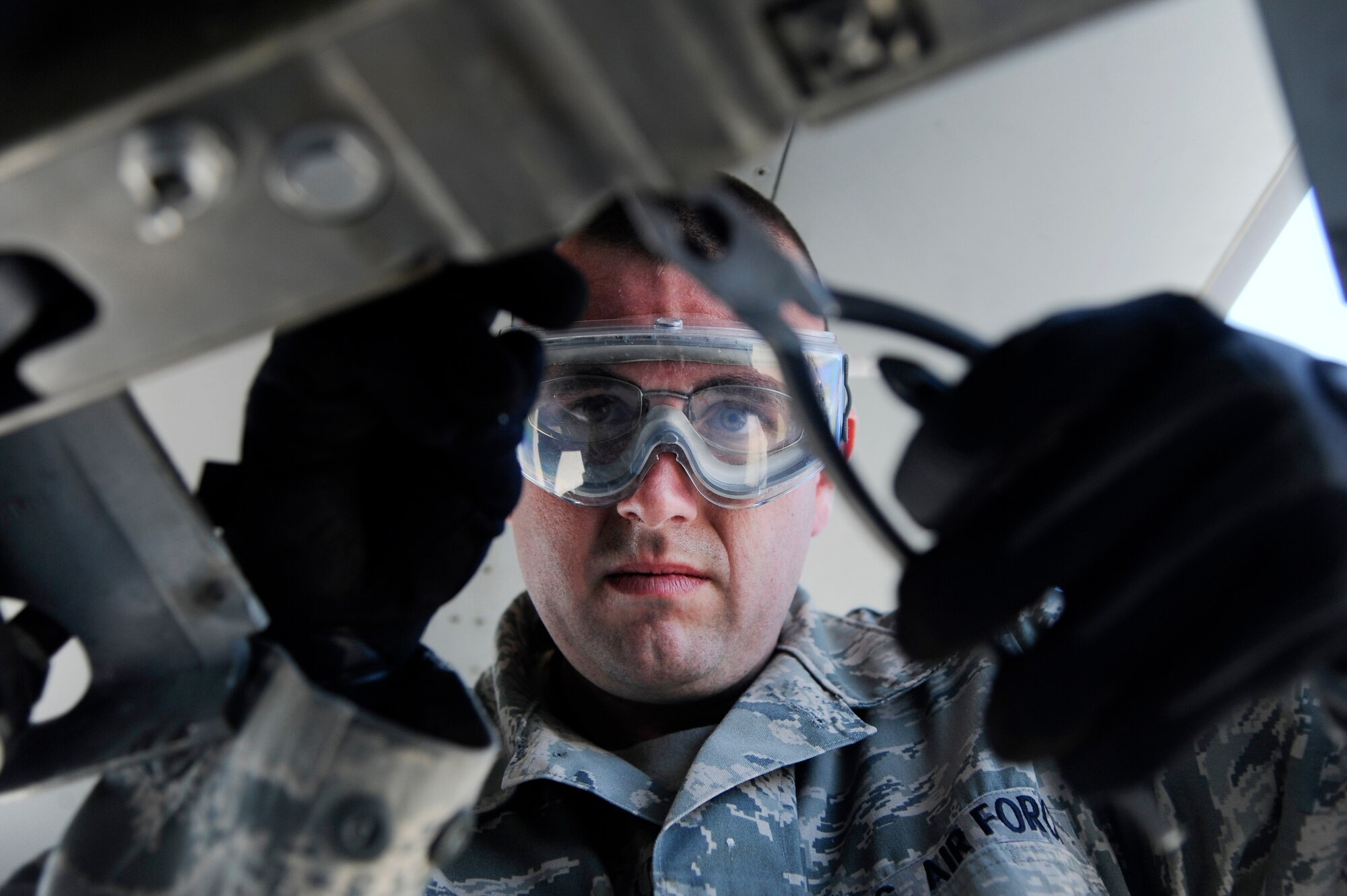 U.S. Air Force Staff Sgt. Daniel Murphy, 77th Aircraft Maintenance Unit weapons load crew chief out of Shaw Air Force Base, S.C., colds the gun system of an F-16 Fighting Falcon during RED FLAG-Alaska 12-2  June 19, 2012, Eielson Air Force Base, Alaska. Colding the gun system is the process of turning off the aircraft weapons system to safely perform maintenance. (U.S. Air Force photo/Staff Sgt. Jim Araos)