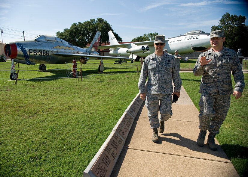 Lt. Col. Michael Thompson, 2nd Bomb Wing director of staff (right), takes Col. Andrew Gebara, 2 BW commander, on a tour of the static display aircraft outside the 8th Air Force Museum on Barksdale Air Force Base, La., June 20. Gebara met with museum officials and discussed ways to improve the facility in order to better serve the base and surrounding community. (U.S. Air Force photo/Staff Sgt. Chad Warren)(RELEASED)