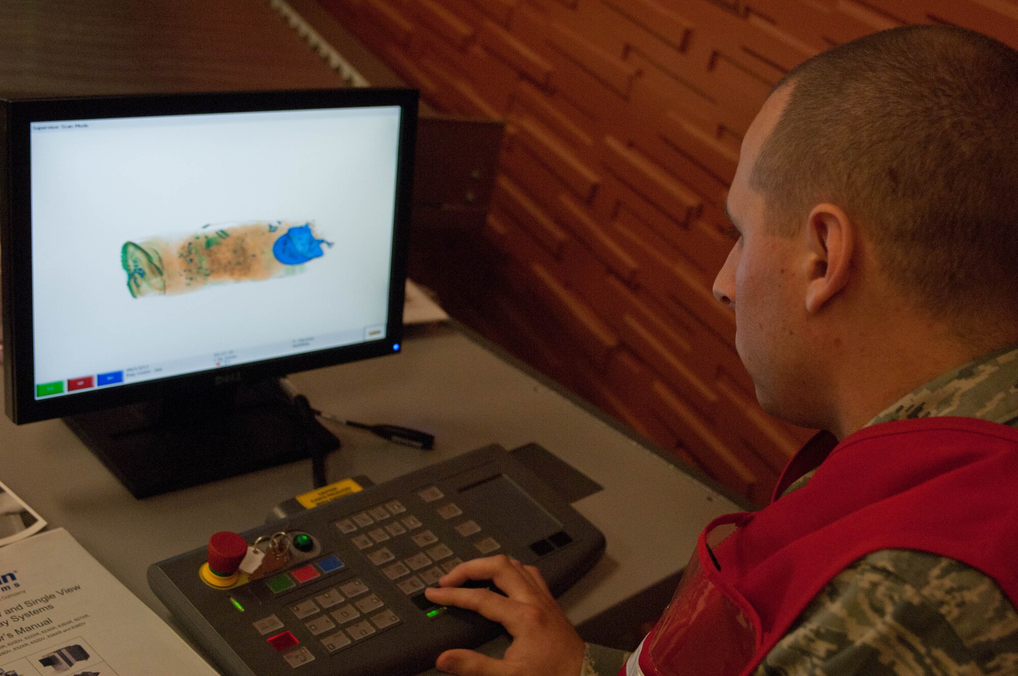 Airman 1st Class Nicholas Ward, 28th Medical Operations Squadron health services management technician, screens luggage with a rapid scan x-ray machine during an Operational Readiness Exercise at Ellsworth Air Force Base, S.D., June 15, 2012. Ellsworth’s new deployment center allows Airmen to completely process personnel and cargo from initial reporting to aircraft take-off. (U.S. Air Force photo by Airman 1st Class Zachary Hada/Released)