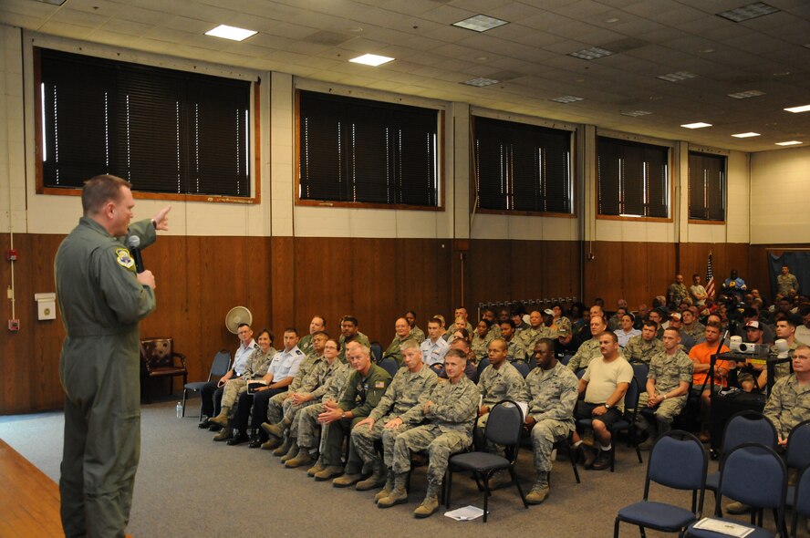 Colonel Samuel Mahaney, 459th Air Refueling Wing commander commends the wing on a great performance and passing score for the Operational Readiness Inspection, June 20 in the wing auditorium. Members of the wing participated in a week-long inspection to Alpena Mich., where they were evaluated on their ability to perform wartime, contingency and force sustainment missions. The wing received a passing grade of satisfactory for the ORI. (U.S. Air Force photo/ Senior Airman Katie Spencer)