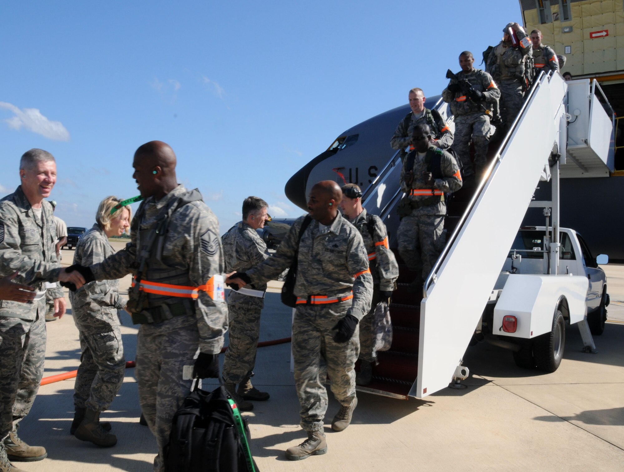 Senior Leadership from the 459th Air Refueling Wing greet Airmen as they return from an Operational Readiness Inspection held in Alpena, Mich., June 16. The Airmen participated in a week-long inspection where they were evaluated on their ability to perform wartime, contingency and force sustainment missions. The wing received a passing grade of satisfactory for the ORI. (U.S. Air Force photo/ Senior Airman Katie Spencer) 