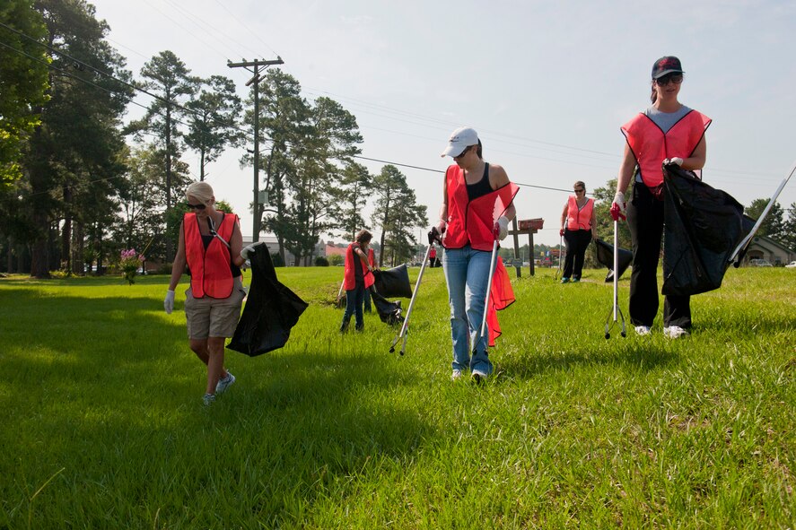 Members of the 75th Fighter Squadron Tiger Shark Spouses Group collect trash along Old Highway 41 South as part of an Adopt-A-Road program June 13, 2012, in Valdosta, Ga. Earlier this year, the group came up with the idea to adopt a highway after discussing ways of showing appreciation to the local community. (U.S. Air Force photo by Staff Sgt. Jamal D. Sutter/Released)