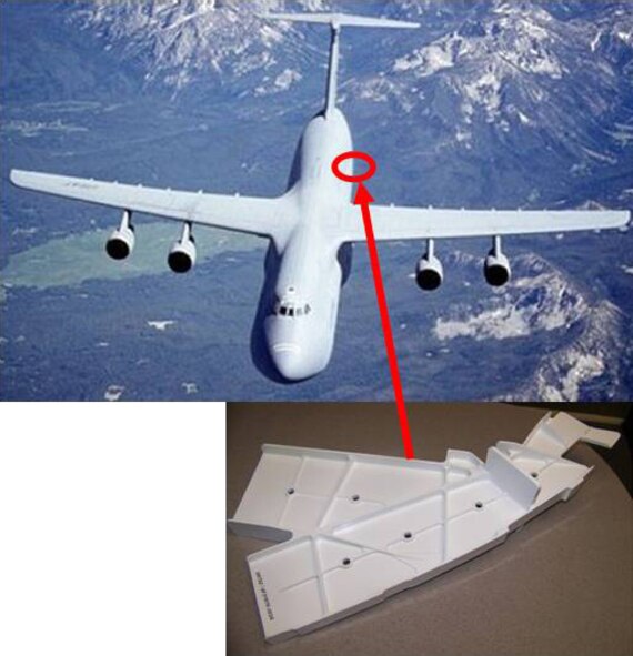 An AFRL-developed process produces all 92 end fitting shapes with just two separate forging dies; the end fittings significantly decrease the a cracking issue in the C-5 bulkhead floor.  (AFRL Image)