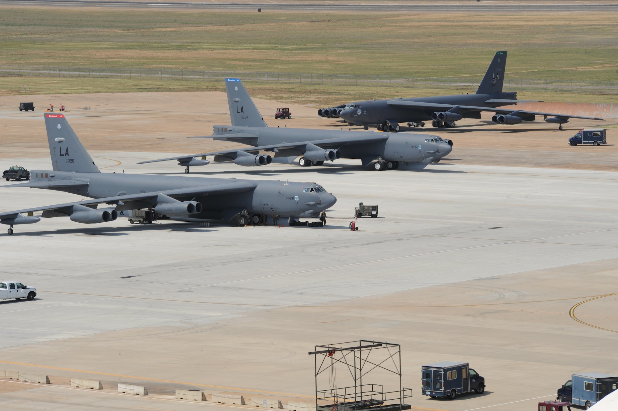 Three B-52H Stratofortress bombers sit on the flightline during an exercise at Barksdale Air Force Base, La., June 5. The exercise highlighted the 2nd Bomb Wing's ability to respond quickly and perform its mission efficiently. (U.S. Air Force photo/Airman 1st Class Benjamin Gonsier)(RELEASED)
