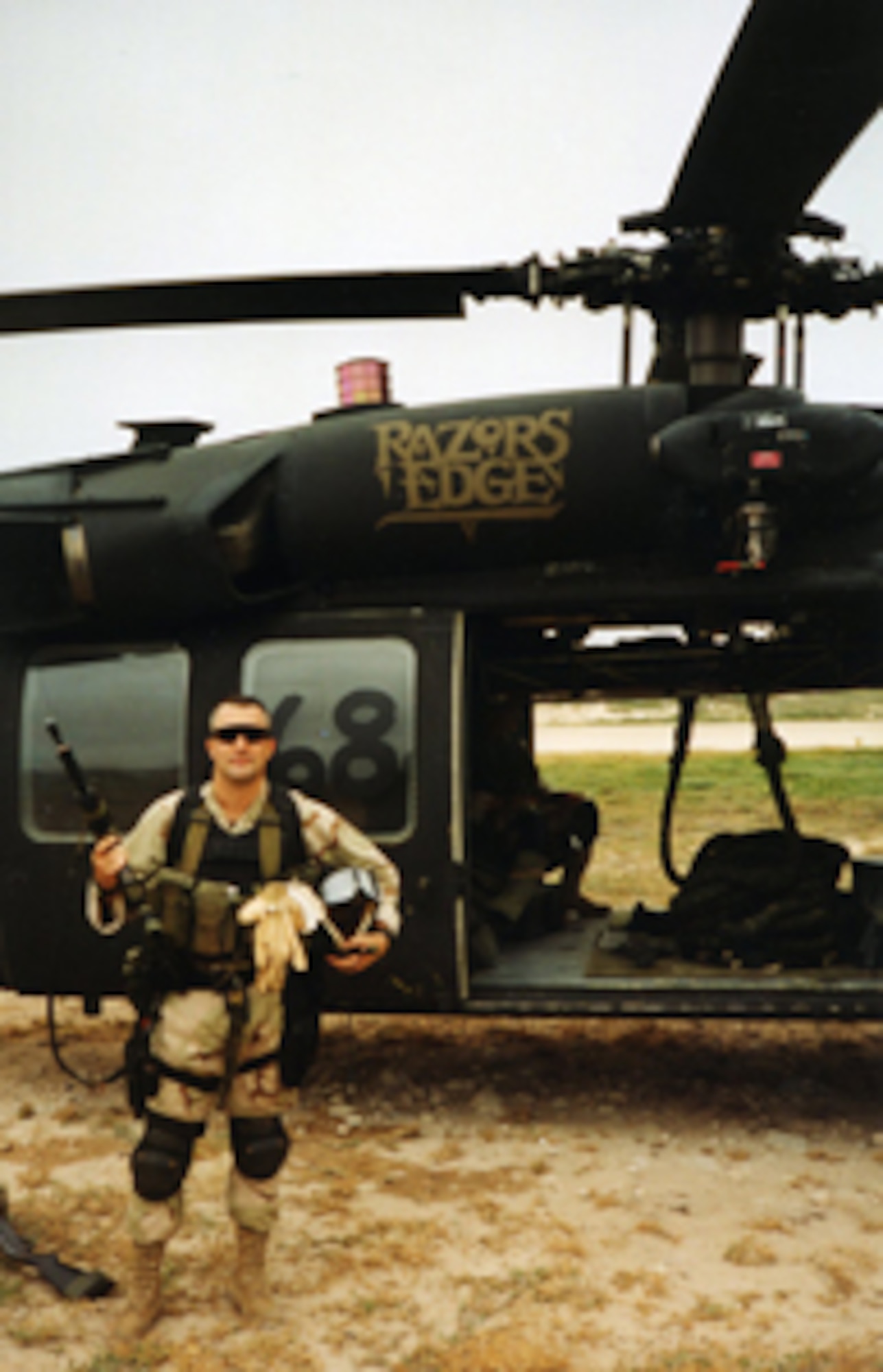 Retired Air Force Master Sgt. Scott Fales stands in front of "Super 6-8." Courtesy Photo
 
