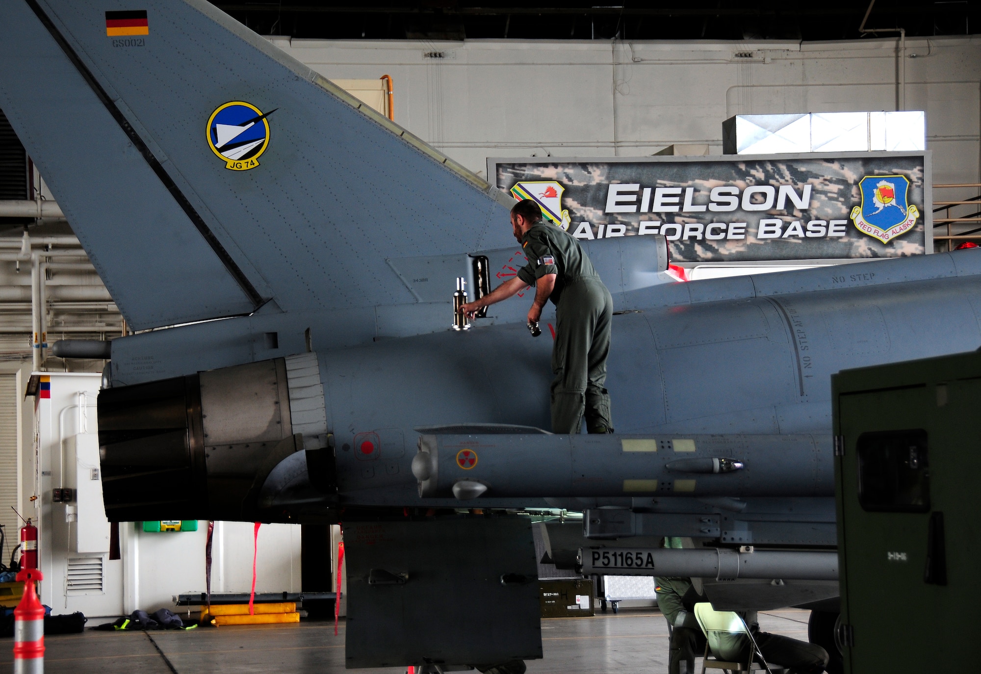 German air force maintainers inspect a German Eurofighter Typhoon in the Thunderdome during RED FLAG-Alaska 12-2, Eielson Air Force Base, Alaska. The German air force brought roughly 150 personnel and eight aircraft to participate in RF-A 12-2. (U.S. Air Force photo/Airman 1st Class Zachary Perras)
