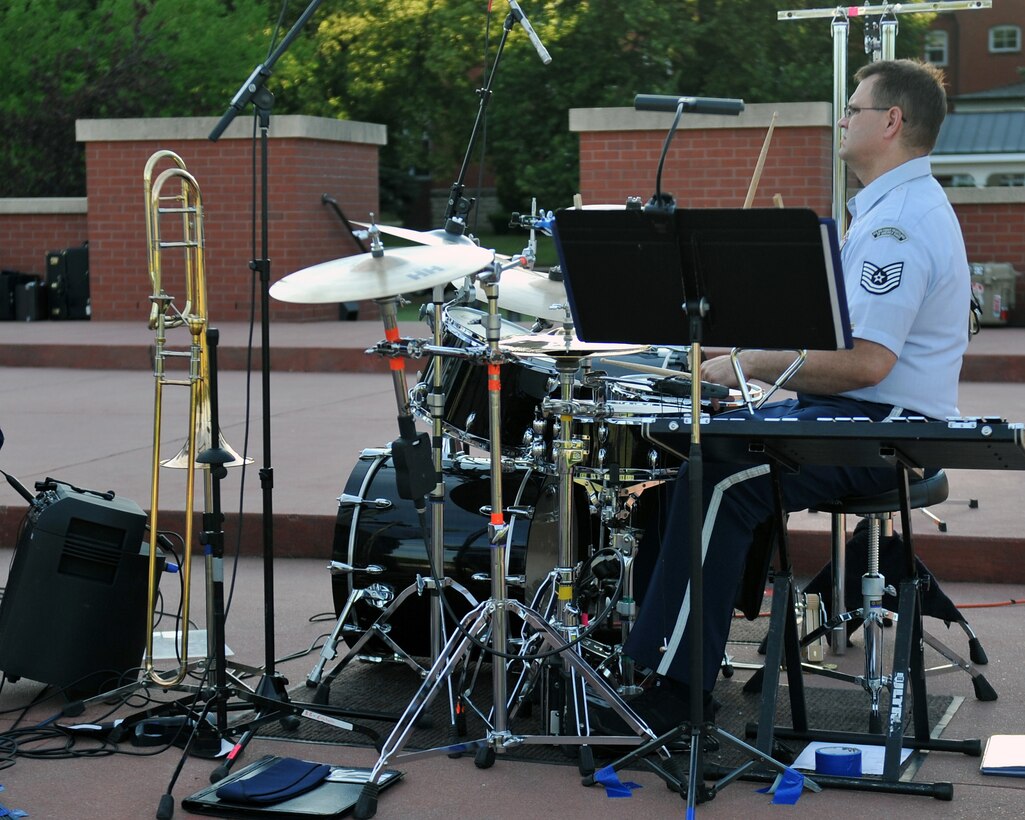Technical Sergeant James Mangette, percussionist with Brass in Blue, performs at the Offutt Air Force Base Parade Field - part of the Heartland of America Band's "Sunday's on Parade" concert series.