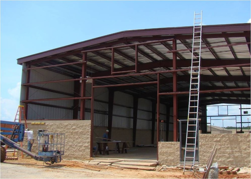 A new 6,000 square foot warehouse is being constructed for a network operations security center at Shaw Air Force Base, S.C Almost $145 million in projects are underway this year on base, not including the housing construction. Much of it will improve life here. (U.S. Air Force courtesy photo/Released)