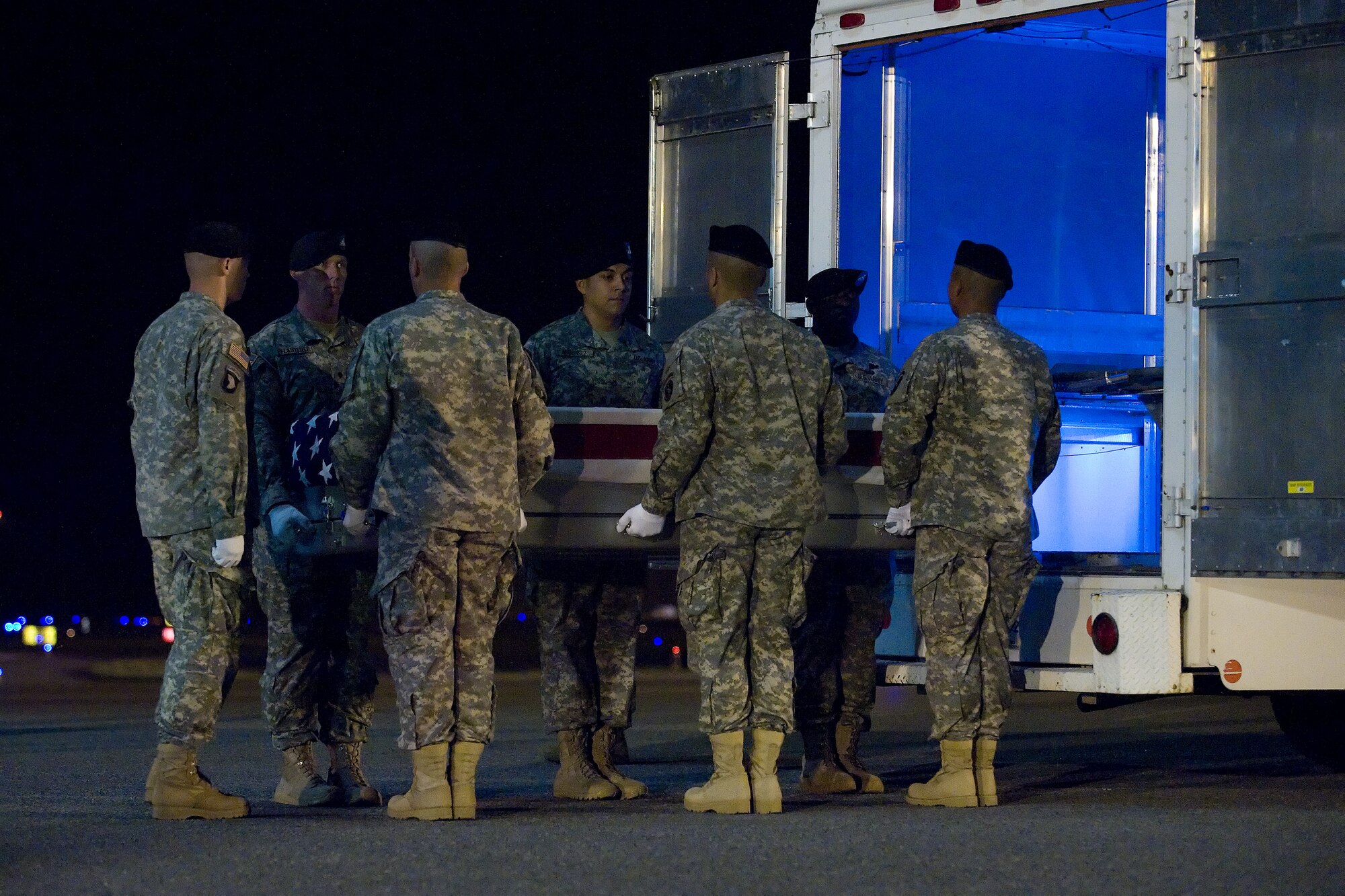 A U.S. Army carry team transfers the remains of Army Pfc. Jarrod A. Lallier of Spokane Wash., at Dover Air Force Base, Del., June 19, 2012. Lallier was assigned to the 1st Battalion, 508th Parachute Infantry Regiment, 4th Brigade Combat Team, 82nd Airborne Division, Fort Bragg, N.C. (U.S. Air Force photo/Adrian R. Rowan)