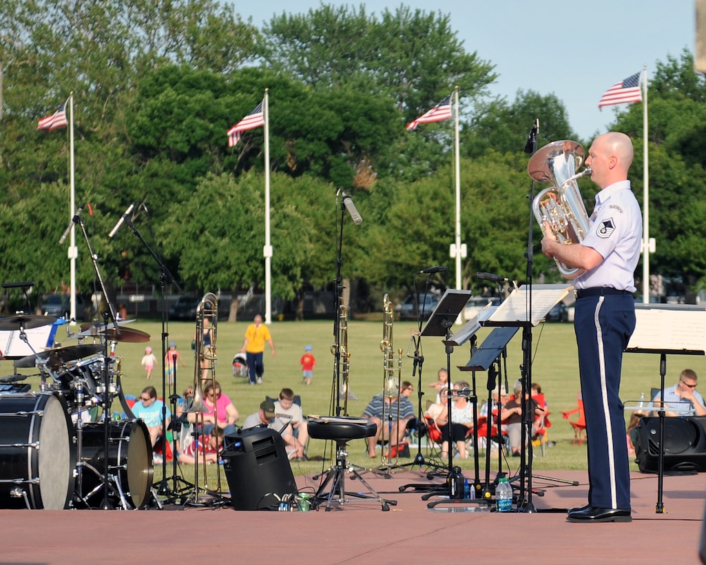 Master Sergeant Matthew Dunsmore warms up for a Brass in Blue performance - part of the Heartland of America Band's "Sunday's on Parade" concert series - on the Offutt Air Force Base Parade Field