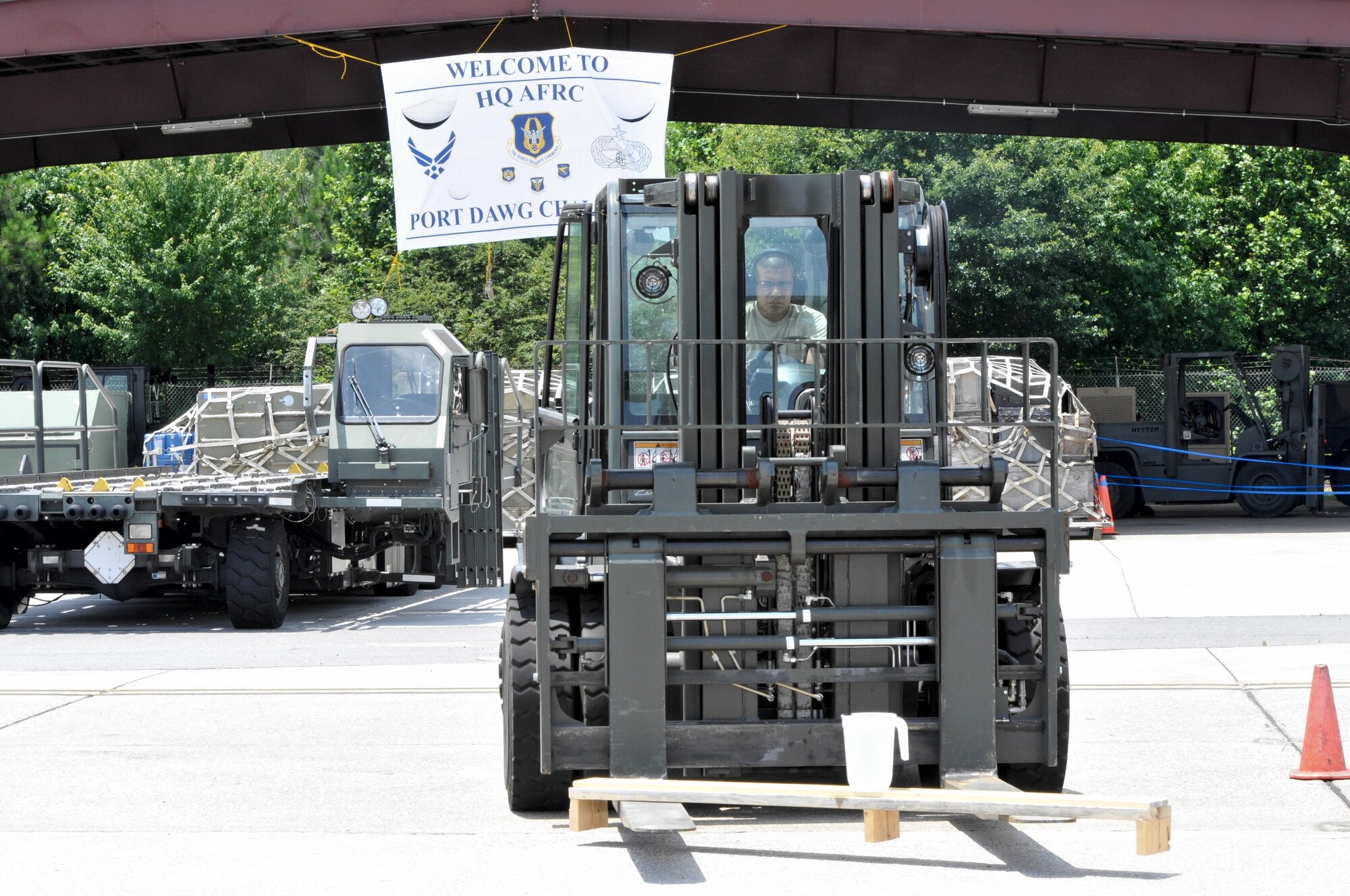Senior Airman Erick Alvarado, 88th Aerial Port Squadron, Joint Base McGuire-Dix-Lakehurst, N.J., expertly maneuvers a forklift while keeping a pitcher of water upright during the 2012 Port Dawg Challenge at Dobbins Air Reserve Base, Ga. (U.S. Air Force photo/Master Sgt Chris Durney)