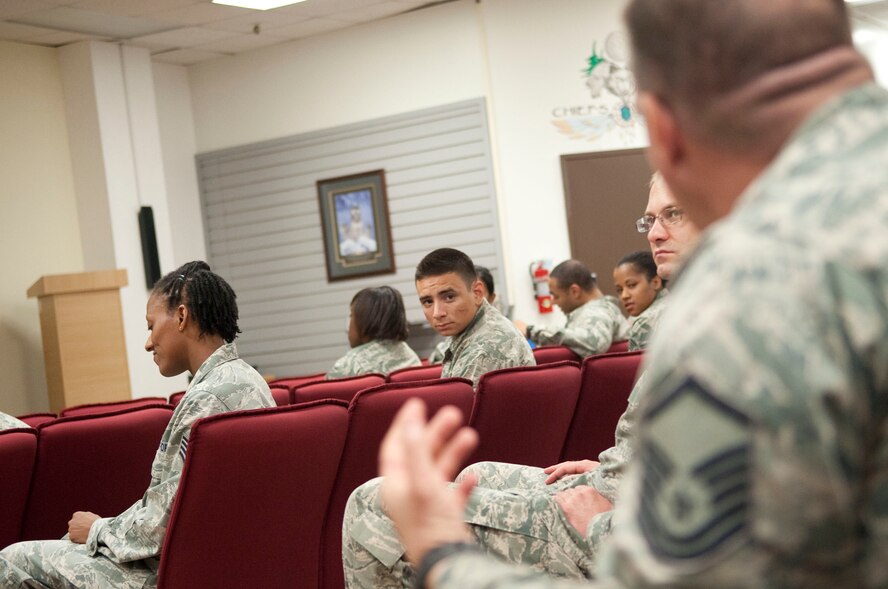 Airman 1st Class Zachary Gonzalez, 8th Maintenance Squadron, listens to advice from Master Sgt. Randy Bray, 8th Aircraft Maintenance Squadron, June 20, 2012, at Kunsan Air Base, Republic of Korea. The Toastmasters-style meeting helped Airmen work on their public speaking skills. (U.S. Air Force photo/Senior Airman Brigitte N. Brantley)