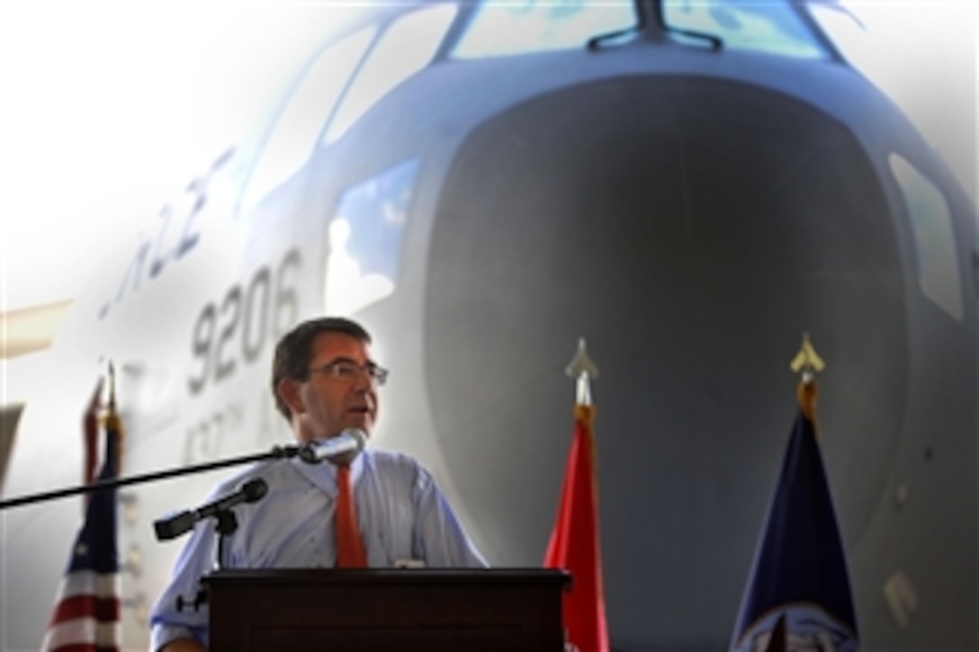 Deputy Secretary of Defense Ashton B. Carter talks to a gathering of several hundred troops assembled in a hangar at Joint Base Charleston in Charleston, S.C., June 18, 2012.  Carter was earlier given a tour of the Vehicular Integrated Solutions Facility and received briefings on space and naval warfare at the Space and Naval Warfare Systems Command.   