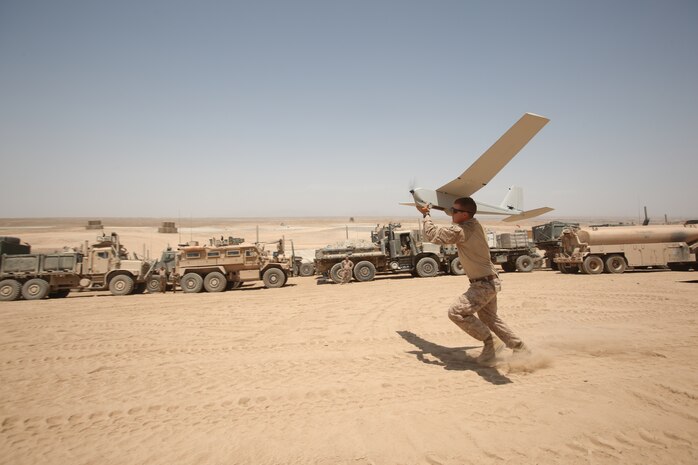 Staff Sgt. Gerhard Tauss launches an unmanned aerial vehicle prior to conducting operations in the scouted area in Nahr-e Saraj, Afghanistan June 20, 2012. Tauss is the platoon sergeant for 2nd platoon, Mobility Assault Company, 1st Combat Engineer Battalion, and operated in support of Operation Jaws as apart of the route clearance effort.