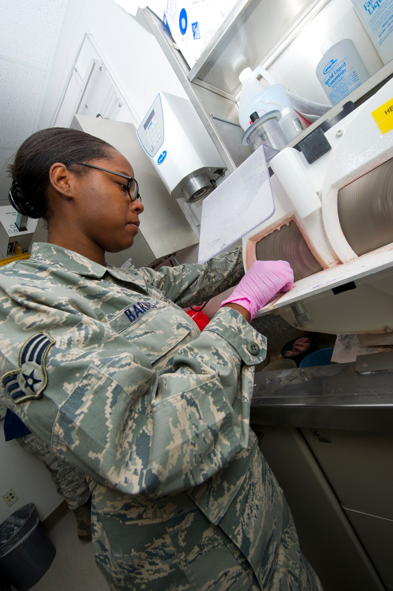 Senior Airman Melissa Barnes, 49th Aeromedical Squadron dental laboratory technician, prepares the ingredients for a dental impression at the Holloman Air Force Base, N.M., June 13. The dental laboratory technicians use a wide variety of tools to help in assisting clinical procedures. (U.S. Air Force photo by Airman 1st Class Daniel E. Liddicoet/Released)