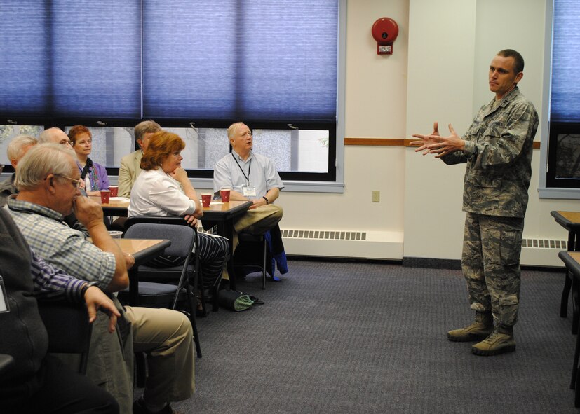 Chaplain (Capt.) Robert Compere, 341st Missile Wing chaplain, explains the role of the base chapel to Great Falls religious officials during Team Malmstrom’s celebration of clergy day. Attendees represented various local denominations.  (U.S. Air Force photo/Airman 1st Class Katrina Heikkinen)