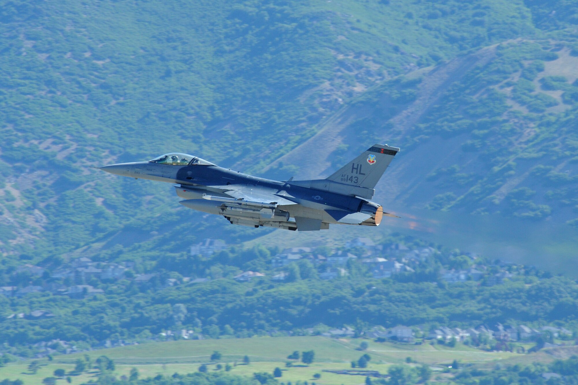 U.S. Air Force Col. Rick LeBlanc, 388th Fighter Wing vice commander, completed his “fini” flight in an F-16 June 19 at Hill Air Force Base. The greeters welcomed LeBlanc with the ceremonial fire truck water arch before spraying LeBlanc with water and champagne. (U.S. Air Force photo by Alex Lloyd/Released)