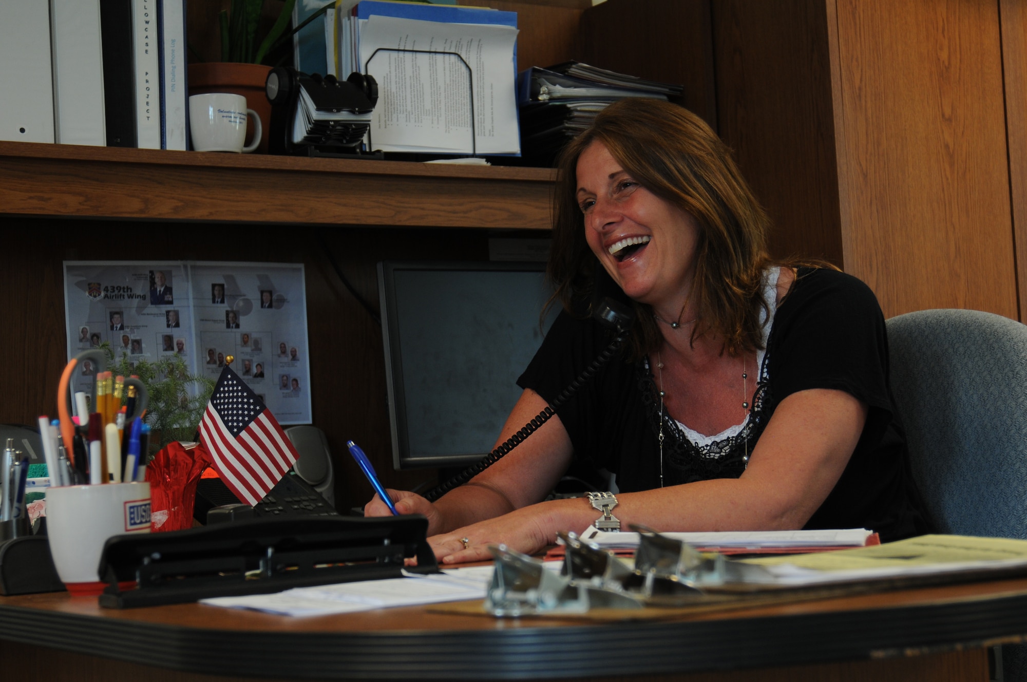 Stephanie Smith, Key Spouse Co-Chair, is credited with revitalizing the base Key Spouse program by continuing to recruit and train new members. When reservists in the wing were mobilized in 2010, she worked with other program members to contact the families of deployed and mobilized reservists. Smith is married to Lt. Col. Raymond Smith, a C-5 pilot in the 337th Airlift Squadron. (U.S. Air Force photo by SrA. Charles Hutchinson)
