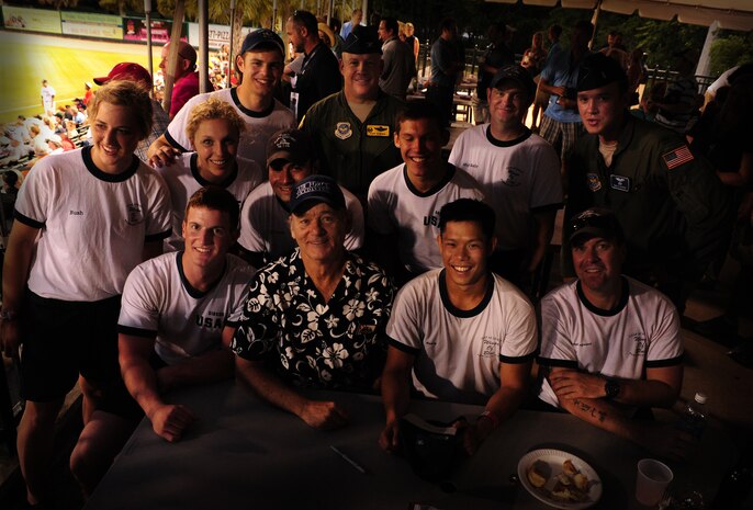 Actor Bill Murray meets with the ‘Wings of Blue’ skydiving team and Col. Erik Hansen, 437th Airlift Wing commander, during the South Atlantic League All-Star game at the Joseph P. Riley, Jr. baseball stadium in Charleston, S.C. June 19, 2012. Murray is a part-owner of the Charleston Riverdogs minor league baseball team. (U.S. Air Force photo / Airman 1st Class Tom Brading)