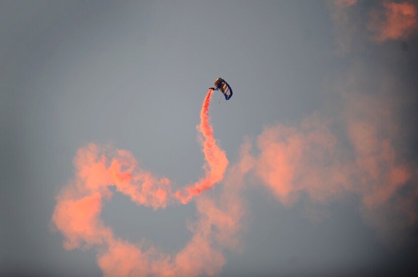 Tech. Sgt.  Juston Demke, a member of the ‘Wings of Blue’ skydiving team from the U.S. Air Force Academy, descends into Joseph P. Riley, Jr. stadium in Charleston, S.C., before the South Atlantic League All-Star game, June 19, 2012. (U.S. Air Force photo/Airman 1st Class Ashlee Galloway)