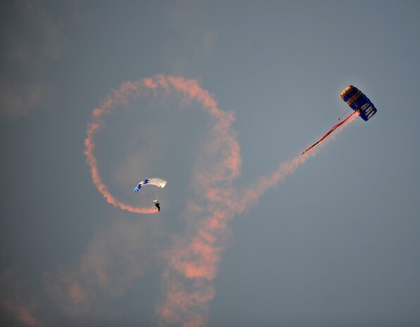 Tech. Sgt. Juston Demke and Tech. Sgt. Andrew Hegwood, members of the ‘Wings of Blue’ skydiving team from the U.S. Air Force Academy, descend into Joseph P. Riley, Jr. stadium in Charleston, S.C., before the South Atlantic League All-Star game, June 19, 2012. (U.S. Air Force photo/Airman 1st Class Ashlee Galloway)