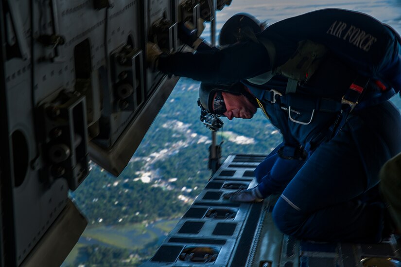 U.S. Air Force Tech. Sgt. Andrew Hegwood, member of the 'Wings of Blue' skydiving team from the U.S. Air Force Academy, prepares to jump from a C-17A Globemaster III over Joseph P. Riley, Jr. Stadium in Charleston, S.C., before the South Atlantic League All-Star game, June 19, 2012. The jump team parachuted in with the ball for the opening pitch of the all-star game.  (U.S. Air Force photo by Airman 1st Class George Goslin)